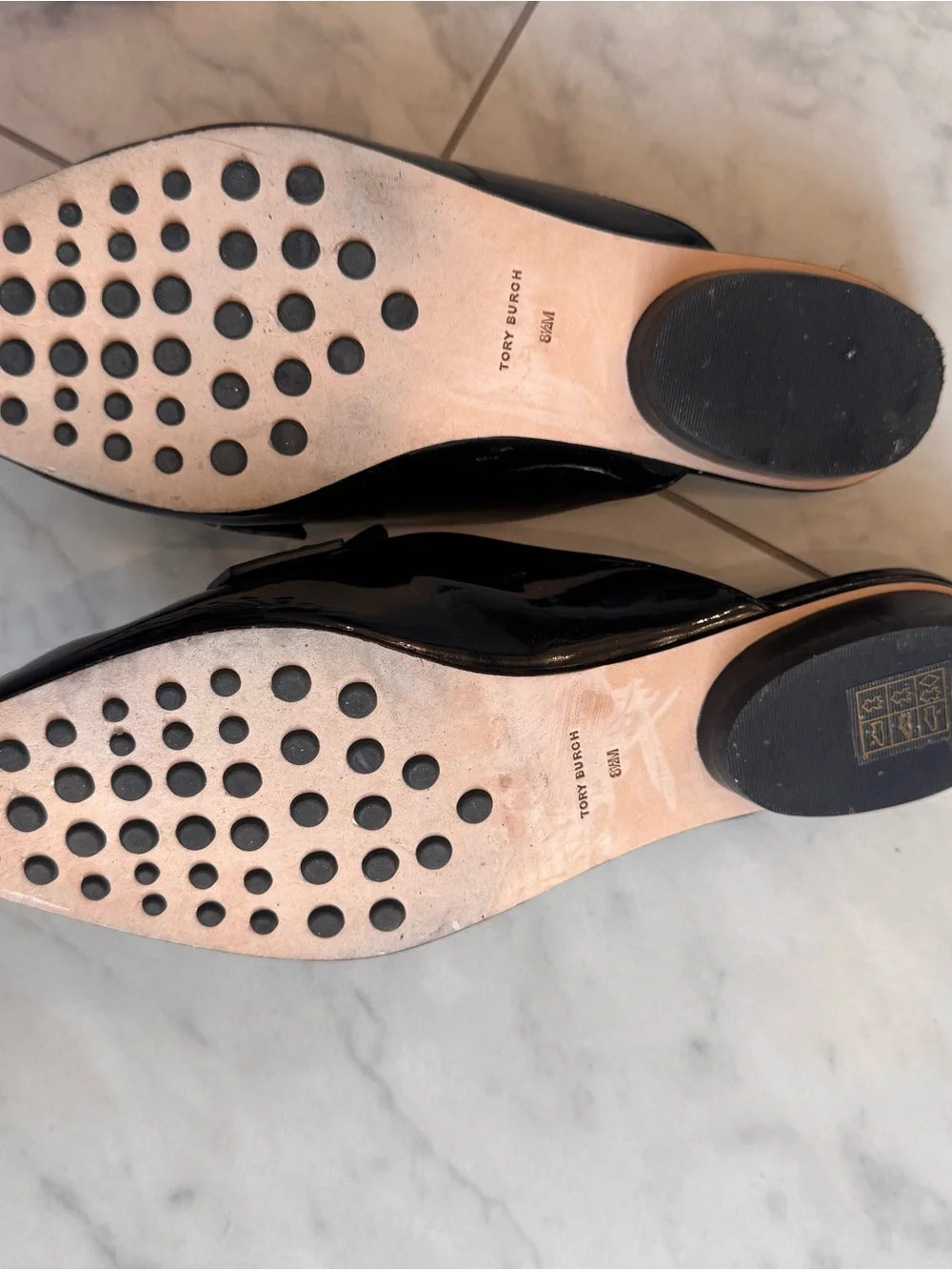 Tory Burch Black Patent Pointed Slip-On Mules with Gold Logo